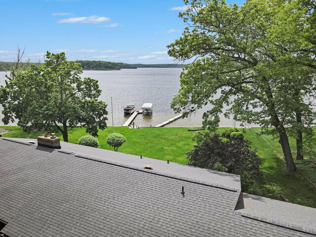 10706 Portage Rd, Portage, MI 49002 - water view featuring a boat dock and boat lift