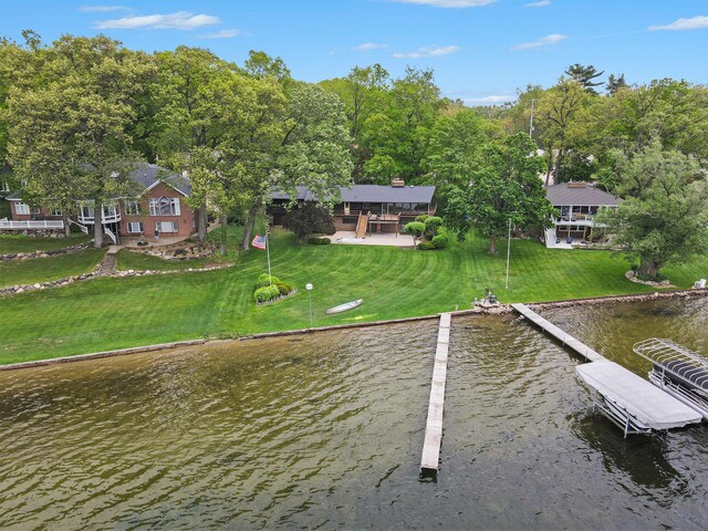 10706 Portage Rd, Portage, MI 49002 - dock area featuring a water view and a yard