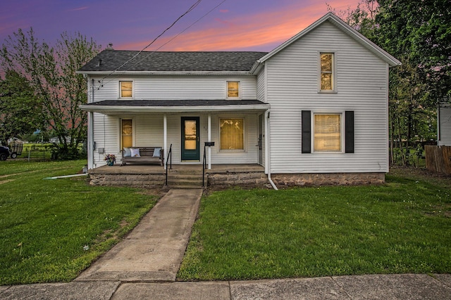 view of front of home featuring a porch and roof with shingles