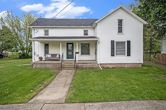 view of front of property with a porch and a shingled roof