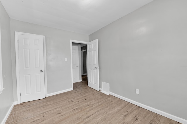 15819 Eastburn St, Detroit, MI 48205 - unfurnished bedroom featuring wood finished floors and baseboards
