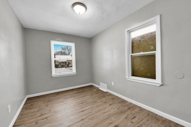 15819 Eastburn St, Detroit, MI 48205 - spare room featuring wood finished floors and baseboards