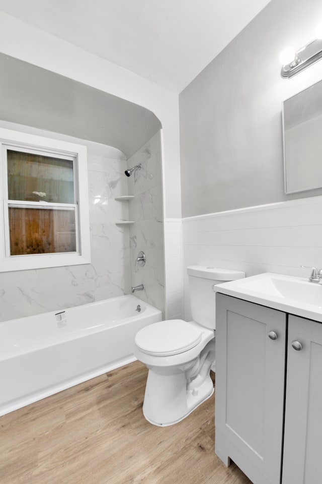 15819 Eastburn St, Detroit, MI 48205 - full bathroom with toilet, bathtub / shower combination, vanity, wainscoting, and wood finished floors