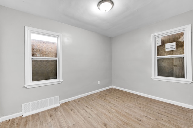 15819 Eastburn St, Detroit, MI 48205 - empty room with wood finished floors and baseboards