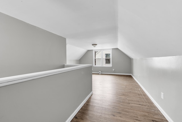 15819 Eastburn St, Detroit, MI 48205 - bonus room with lofted ceiling, wood finished floors, and baseboards