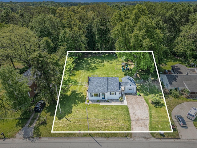 509 W W Burr Oak St, Centreville, MI 49032 - view from above of property featuring property boundaries highlighted and a heavily wooded area