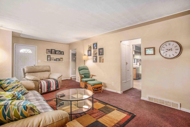 carpeted living room featuring baseboards