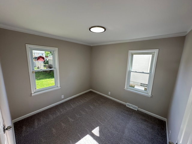 92 W Princeton Ave, Pontiac, MI 48340 - unfurnished room with crown molding, dark colored carpet, and baseboards