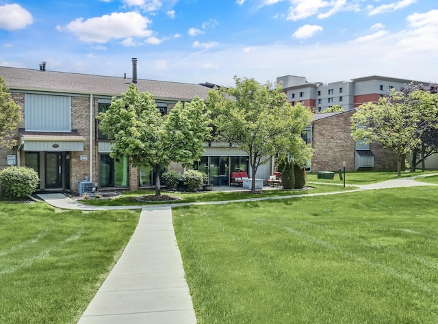 18061 University Park Dr Unit 46, Livonia, MI 48152 - view of property featuring central air condition unit