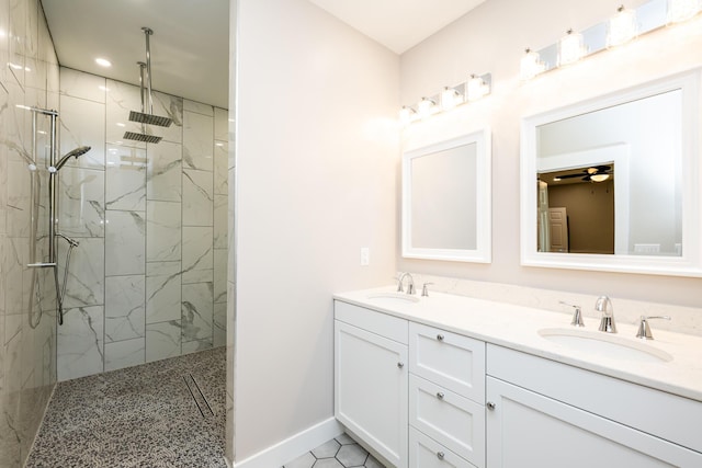 508 S Jameson St, New Buffalo, MI 49117 - full bath with a marble finish shower, baseboards, and double vanity