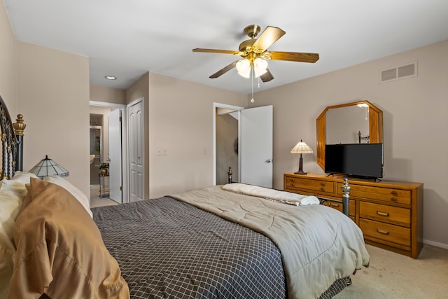 1696 S Hill Blvd, Bloomfield Hills, MI 48304 - bedroom with light colored carpet, baseboards, a ceiling fan, and ensuite bath