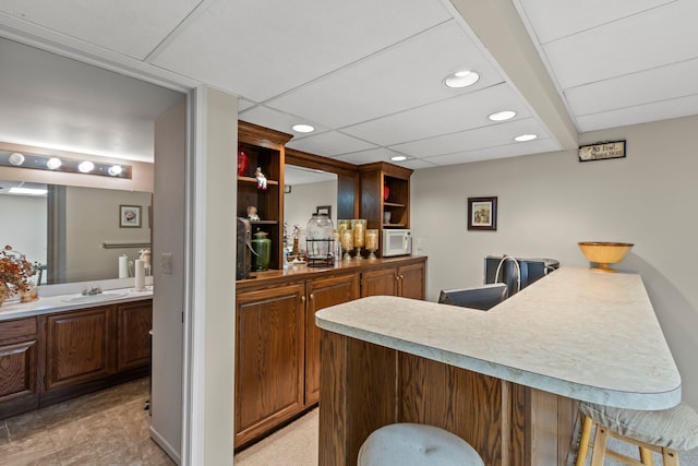 1696 S Hill Blvd, Bloomfield Hills, MI 48304 - indoor bar with white microwave and recessed lighting