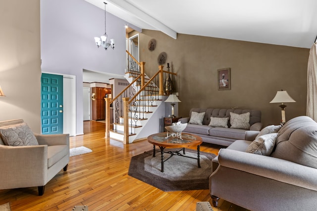 1696 S Hill Blvd, Bloomfield Hills, MI 48304 - living area featuring a chandelier, light wood finished floors, stairs, beam ceiling, and high vaulted ceiling