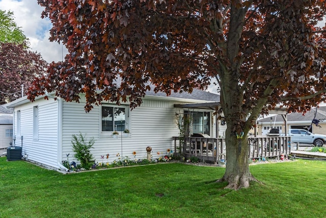 133 Loretta St, East China, MI 48054 - view of front facade featuring a front lawn, central air condition unit, and a deck