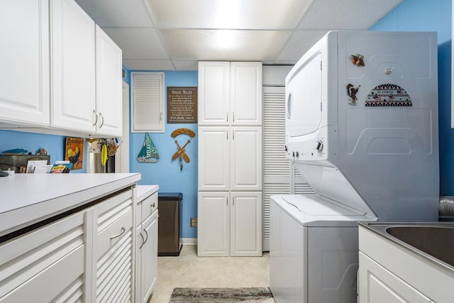133 Loretta St, East China, MI 48054 - washroom with stacked washer / dryer and cabinet space