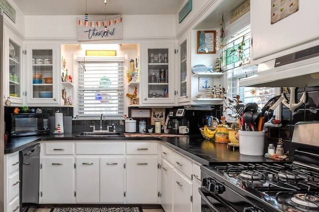 133 Loretta St, East China, MI 48054 - kitchen featuring black appliances, a sink, dark countertops, white cabinets, and under cabinet range hood