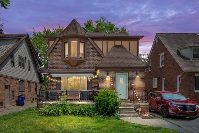6110 Yorkshire Rd, Detroit, MI 48224 - english style home featuring brick siding and roof with shingles
