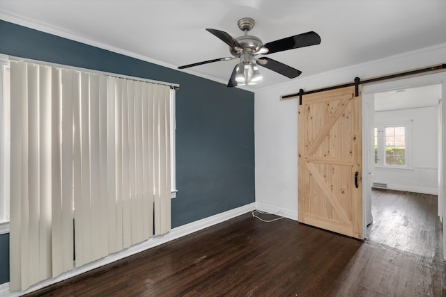 6110 Yorkshire Rd, Detroit, MI 48224 - unfurnished room featuring a ceiling fan, a barn door, wood finished floors, baseboards, and crown molding