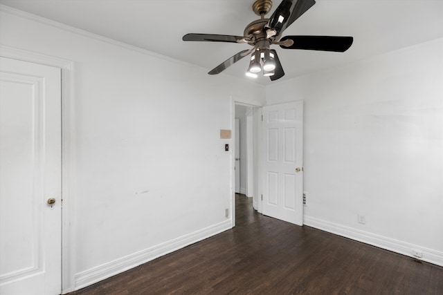 6110 Yorkshire Rd, Detroit, MI 48224 - unfurnished room featuring dark wood-type flooring, ceiling fan, baseboards, and crown molding