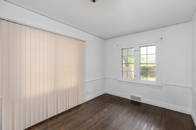 6110 Yorkshire Rd, Detroit, MI 48224 - spare room with dark wood-type flooring and baseboards