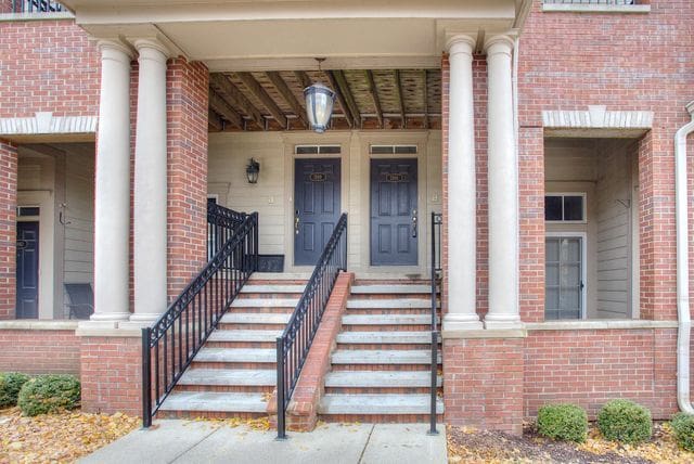 3986 Forester Blvd, Auburn Hills, MI 48326 - entrance to property with brick siding and covered porch