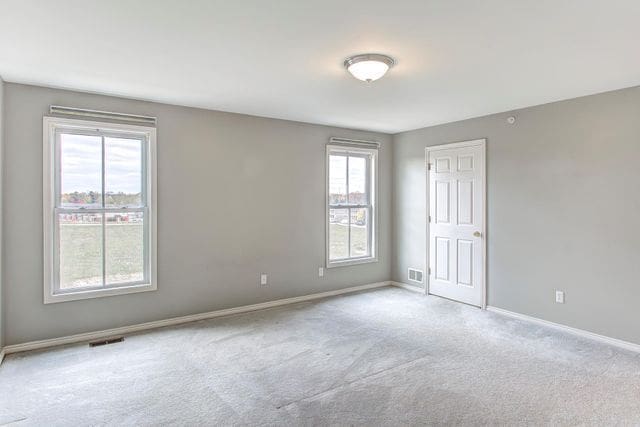 3986 Forester Blvd, Auburn Hills, MI 48326 - empty room with baseboards and carpet flooring