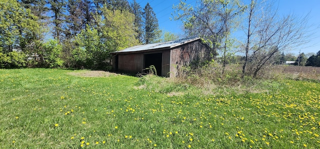 view of outbuilding featuring an outdoor structure