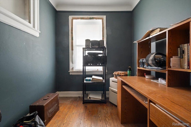 8214 Saint Marys St, Detroit, MI 48228 - home office featuring dark wood-style flooring and baseboards