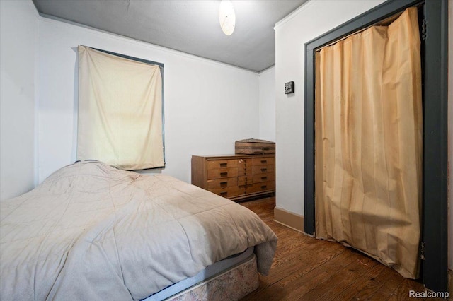 8214 Saint Marys St, Detroit, MI 48228 - bedroom featuring wood finished floors and ornamental molding
