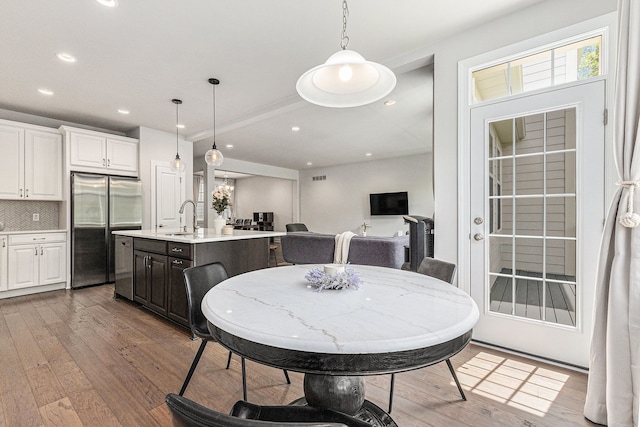 3328 Roseford Blvd, Ann Arbor, MI 48105 - dining area featuring hardwood / wood-style flooring and recessed lighting