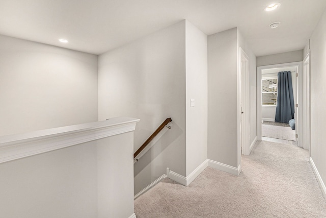 3328 Roseford Blvd, Ann Arbor, MI 48105 - corridor featuring an upstairs landing, carpet, recessed lighting, and baseboards