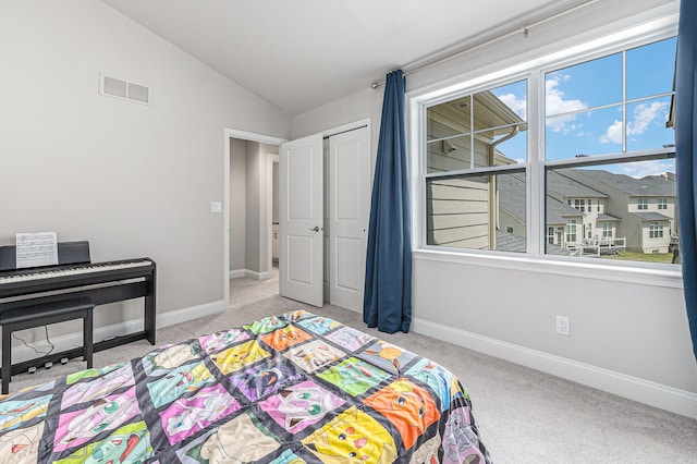 3328 Roseford Blvd, Ann Arbor, MI 48105 - bedroom featuring carpet, vaulted ceiling, and baseboards