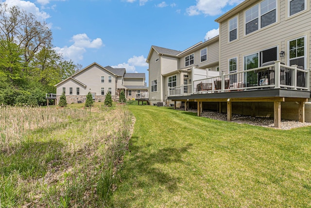 3328 Roseford Blvd, Ann Arbor, MI 48105 - rear view of property featuring a wooden deck and a yard
