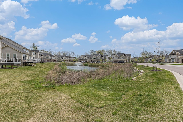 3328 Roseford Blvd, Ann Arbor, MI 48105 - view of grassy yard with a residential view and a water view