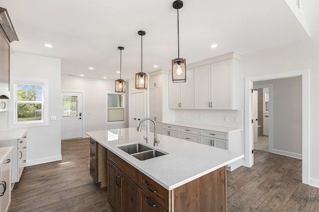 9693 Beverly Dr, Lakeland, MI 48143 - kitchen with a sink, dark wood finished floors, baseboards, white cabinetry, and recessed lighting