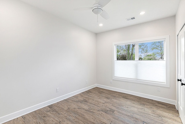 9693 Beverly Dr, Lakeland, MI 48143 - empty room featuring baseboards, wood finished floors, ceiling fan, and recessed lighting