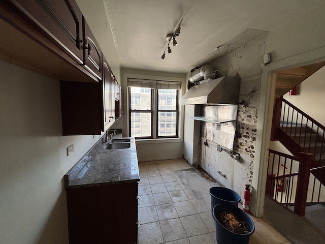 8162 E Jefferson Ave Unit 16B, Detroit, MI 48214 - kitchen featuring a sink and dark countertops
