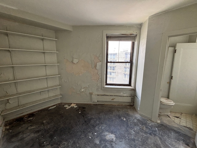 8162 E Jefferson Ave Unit 16B, Detroit, MI 48214 - unfurnished bedroom featuring baseboard heating