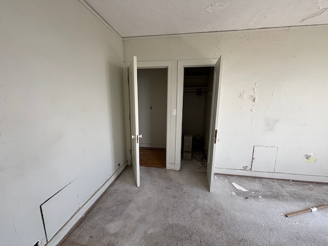 8162 E Jefferson Ave Unit 16B, Detroit, MI 48214 - unfurnished bedroom featuring carpet and a closet