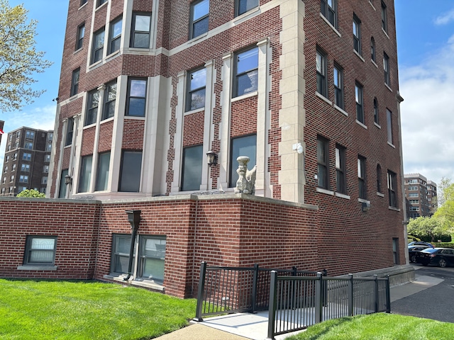 8162 E Jefferson Ave Unit 16B, Detroit, MI 48214 - view of property with fence