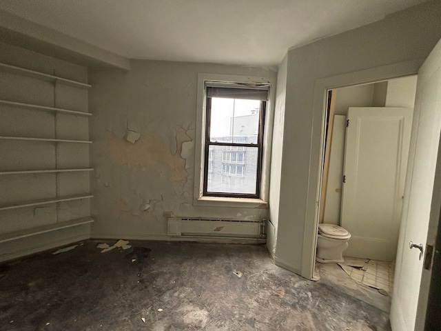 8162 E Jefferson Ave Unit 16B, Detroit, MI 48214 - unfurnished bedroom featuring a baseboard heating unit