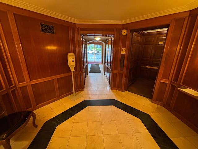 8162 E Jefferson Ave Unit 16B, Detroit, MI 48214 - hall featuring crown molding, light tile patterned flooring, inlaid floor details, and wooden walls