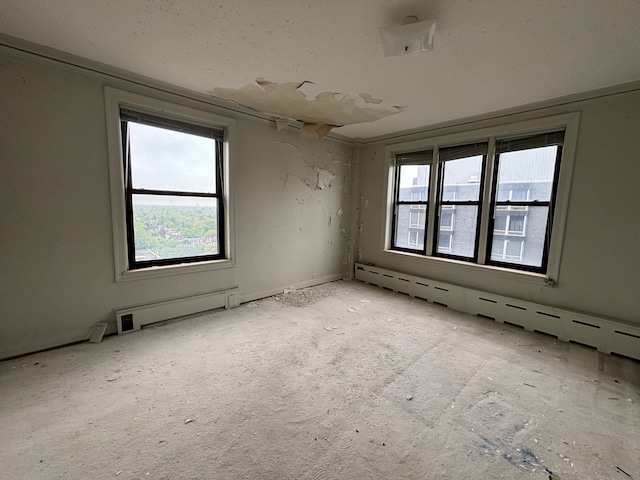 8162 E Jefferson Ave Unit 16B, Detroit, MI 48214 - empty room featuring baseboard heating and a baseboard radiator