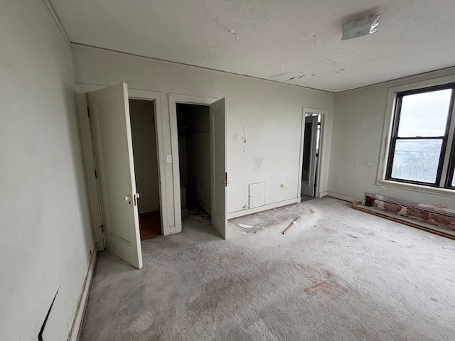8162 E Jefferson Ave Unit 16B, Detroit, MI 48214 - unfurnished bedroom featuring light colored carpet