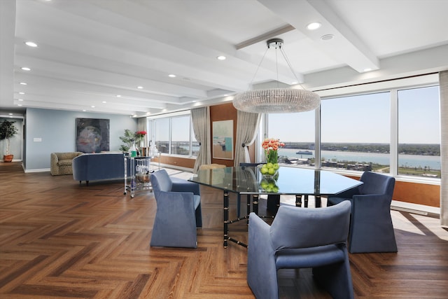 1300 E Lafayette St Unit 2003, 04, 05, Detroit, MI 48207 - dining room featuring baseboards, recessed lighting, beamed ceiling, and a water view