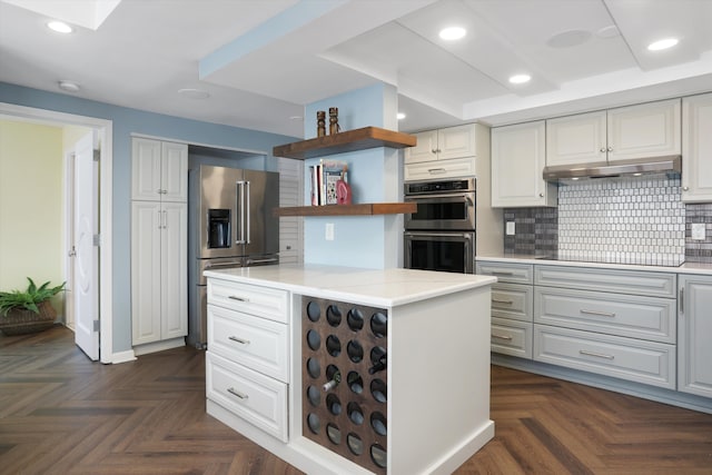 1300 E Lafayette St Unit 2003, 04, 05, Detroit, MI 48207 - kitchen with appliances with stainless steel finishes, open shelves, under cabinet range hood, recessed lighting, and tasteful backsplash