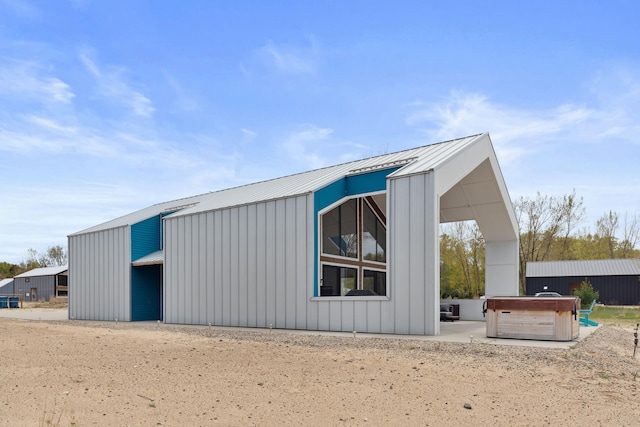7469 Lake Solis Dr, Stevensville, MI 49127 - view of outdoor structure with a hot tub