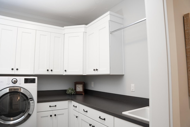 8182 Country Rail Dr SW, Byron Center, MI 49315 - laundry area featuring washer / clothes dryer and cabinet space