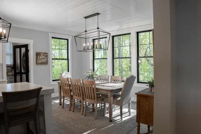 8182 Country Rail Dr SW, Byron Center, MI 49315 - dining room with a chandelier and baseboards