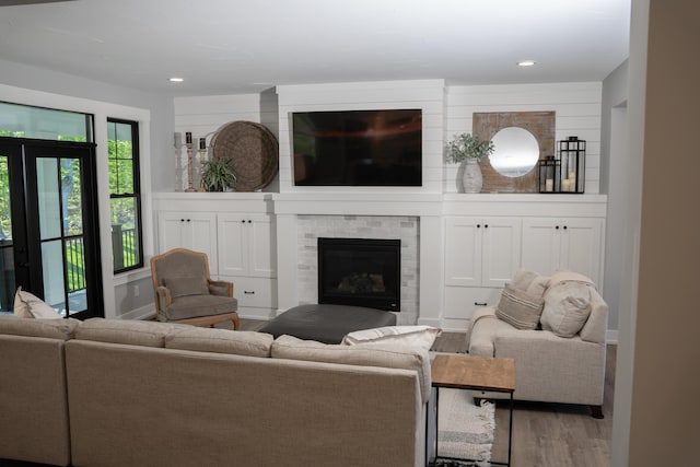 8182 Country Rail Dr SW, Byron Center, MI 49315 - living room with wood finished floors, recessed lighting, and a fireplace
